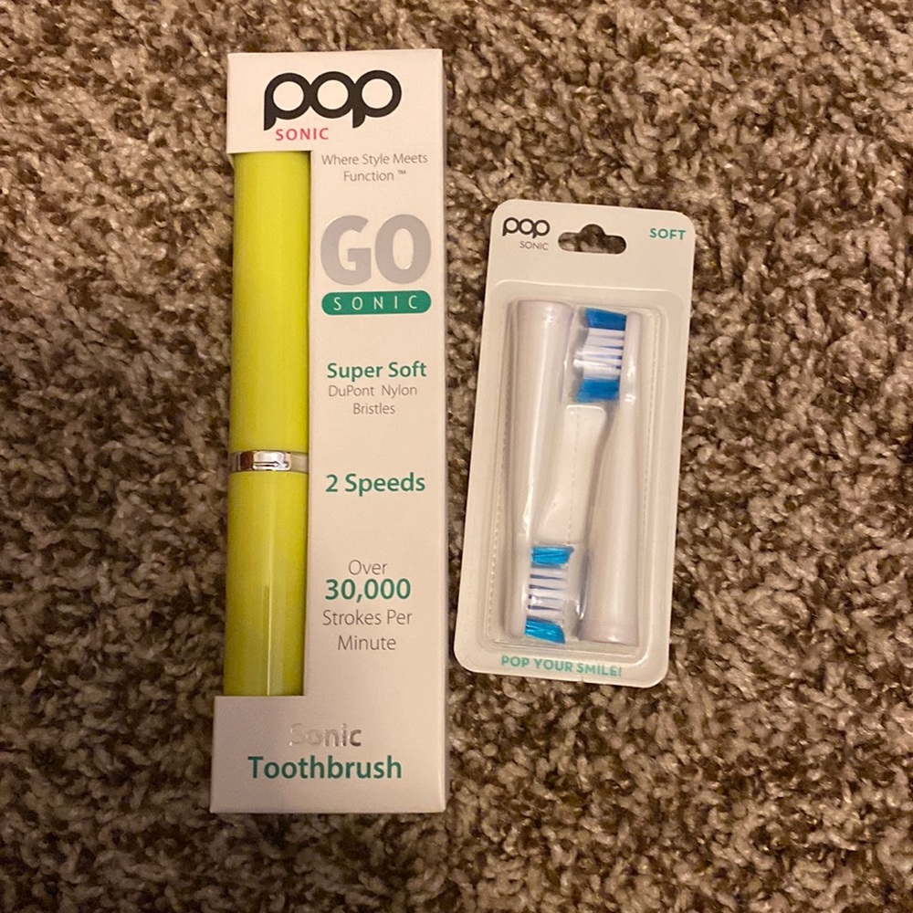 Pop sonic toothbrush with replacement heads